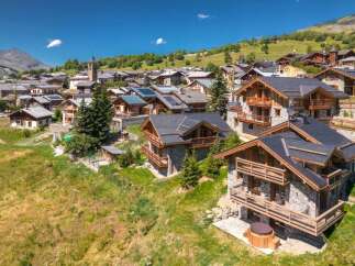 Experience luxury mountain living in this stunning chalet nestled in a picturesque village.