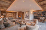Experience luxurious mountain living in this stunning chalet-style living room.