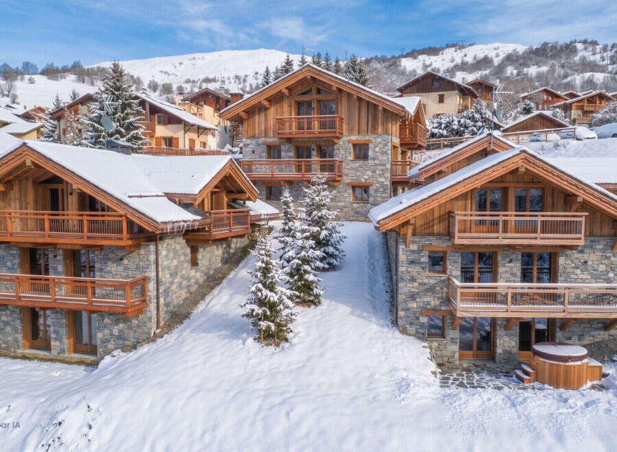 Experience luxury mountain living in this stunning chalet, nestled amidst snow-covered slopes and picturesque villages.