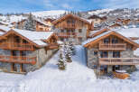 Experience luxury mountain living in this stunning chalet, nestled amidst snow-covered slopes and picturesque villages.
