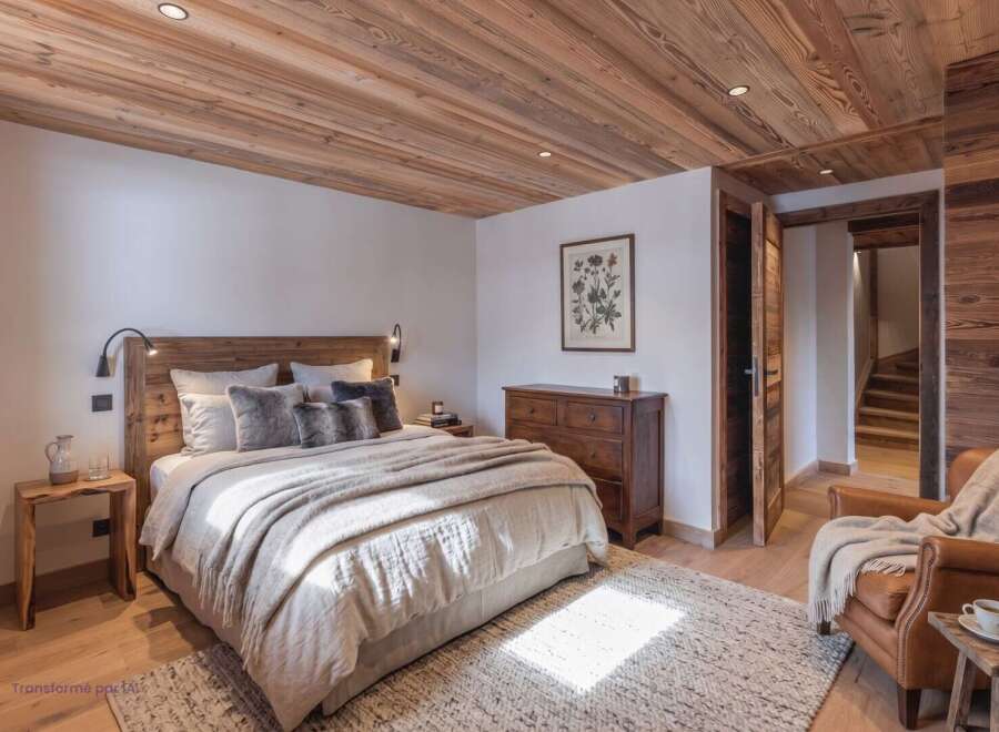 Experience rustic charm and modern comfort in this beautifully appointed bedroom.
