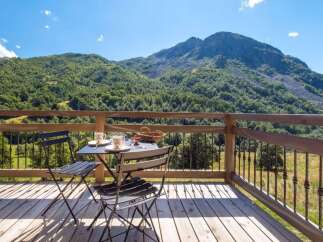 Enjoy breathtaking mountain views from this charming balcony, perfect for morning coffee or evening relaxation.