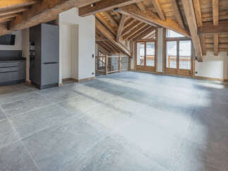 Experience rustic charm and modern luxury in this spacious attic apartment.