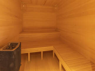 Experience ultimate relaxation in this beautifully crafted wooden sauna.
