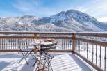 Experience breathtaking mountain views from this charming balcony, perfect for enjoying a morning coffee or evening tea.