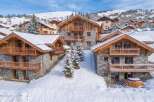 Experience luxury mountain living in this stunning chalet, nestled amidst snow-covered slopes and picturesque villages.