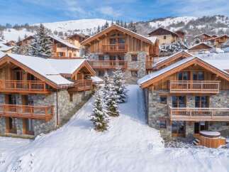 Experience luxury mountain living in this stunning chalet, nestled amidst snow-covered slopes and picturesque villages.