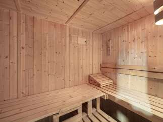 Experience ultimate relaxation in this beautifully crafted wooden sauna.