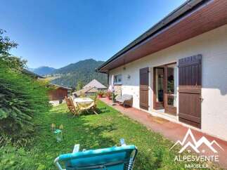 Enjoy the stunning mountain views from this charming property's outdoor living space.
