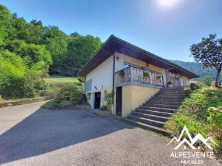 Discover this charming property nestled amidst lush greenery and rolling hills, offering a serene escape.