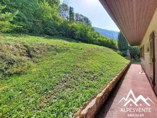 Discover this charming property nestled in a serene, green landscape, perfect for those seeking tranquility.