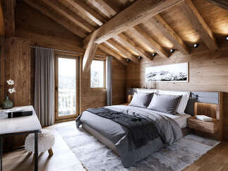 Experience rustic luxury in this charming wooden cabin bedroom, featuring a plush king-sized bed adorned with soft grey linens and a cozy throw blanket.