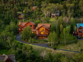 Nestled amidst lush greenery, this stunning mountain estate offers unparalleled luxury and privacy.