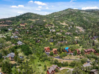 Nestled amidst lush greenery and rolling hills, this stunning mountain retreat offers unparalleled luxury and privacy.
