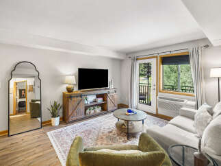 Step into this inviting living room, perfect for relaxation and entertainment.