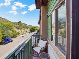 Enjoy breathtaking mountain views from this charming balcony, perfect for your morning coffee or evening relaxation.