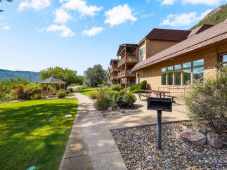 Enjoy outdoor living with this property's charming gazebo and convenient barbecue grill area, perfect for gatherings.