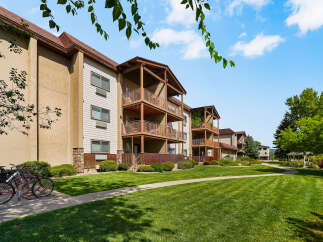 Discover comfortable living in this apartment complex featuring multi-level balconies perfect for enjoying the outdoors.