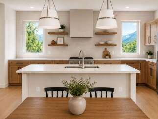Experience modern living in this stunning kitchen featuring sleek white countertops, warm wood cabinetry, and a spacious island perfect for entertaining.