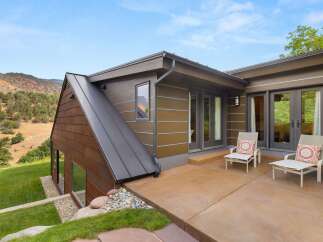 Experience modern living with this stunning home featuring a unique architectural design and breathtaking mountain views.