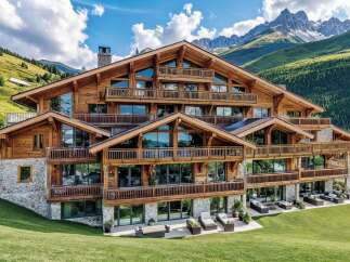 Experience unparalleled luxury in this stunning multi-story wooden chalet nestled against majestic mountains.