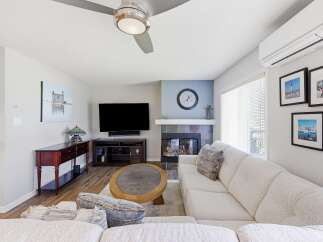Step into this inviting living room, perfect for relaxation and entertainment.