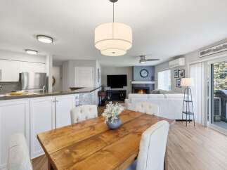 Experience open-concept living with this beautifully appointed dining and living area, perfect for entertaining.