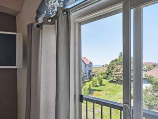 Enjoy stunning water views from this charming property, featuring a spacious balcony perfect for relaxing or entertaining.