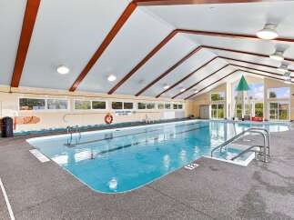 Dive into this indoor swimming pool, perfect for year-round enjoyment.