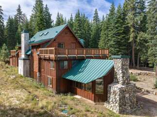 Nestled amidst a serene forest, this charming log cabin offers a rustic retreat with modern comforts.