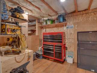 This workshop space is equipped with essential tools for any DIY enthusiast or professional.