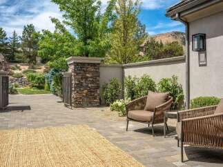 Experience outdoor living at its finest with this inviting patio space, perfect for relaxing or entertaining.