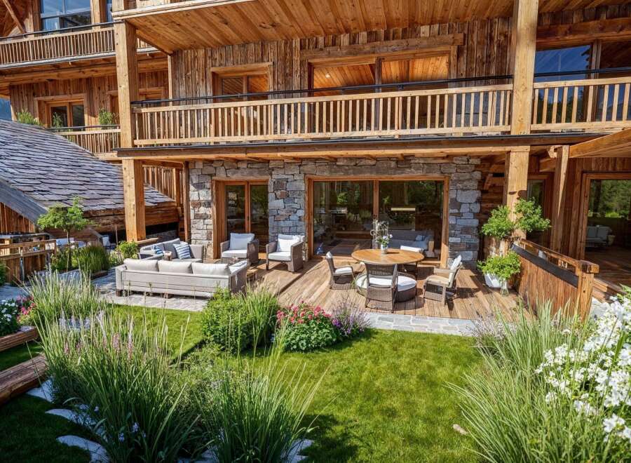 Experience luxury mountain living with this stunning property featuring a spacious wooden deck and a beautifully landscaped garden.