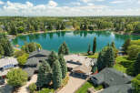 Experience luxury lakeside living in this stunning property, boasting direct access to a serene lake perfect for all your water activities.