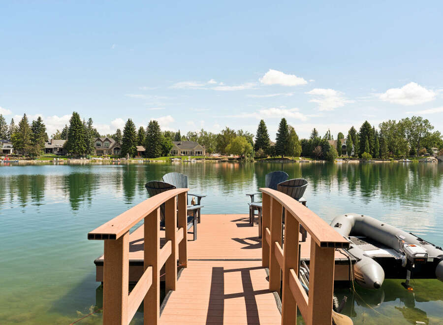 Enjoy waterfront living with this stunning property featuring a private dock and direct lake access.