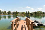 Enjoy waterfront living with this stunning property featuring a private dock and direct lake access.