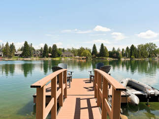 Enjoy waterfront living with this stunning property featuring a private dock and direct lake access.