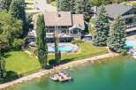 Experience luxury waterfront living in this stunning property featuring a private dock and boat access.
