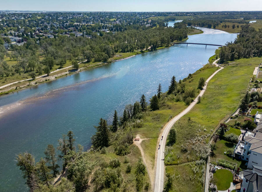 Experience luxury living with stunning riverfront views and direct access to scenic walking and biking trails.