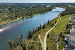 Experience luxury living with stunning riverfront views and direct access to scenic walking and biking trails.