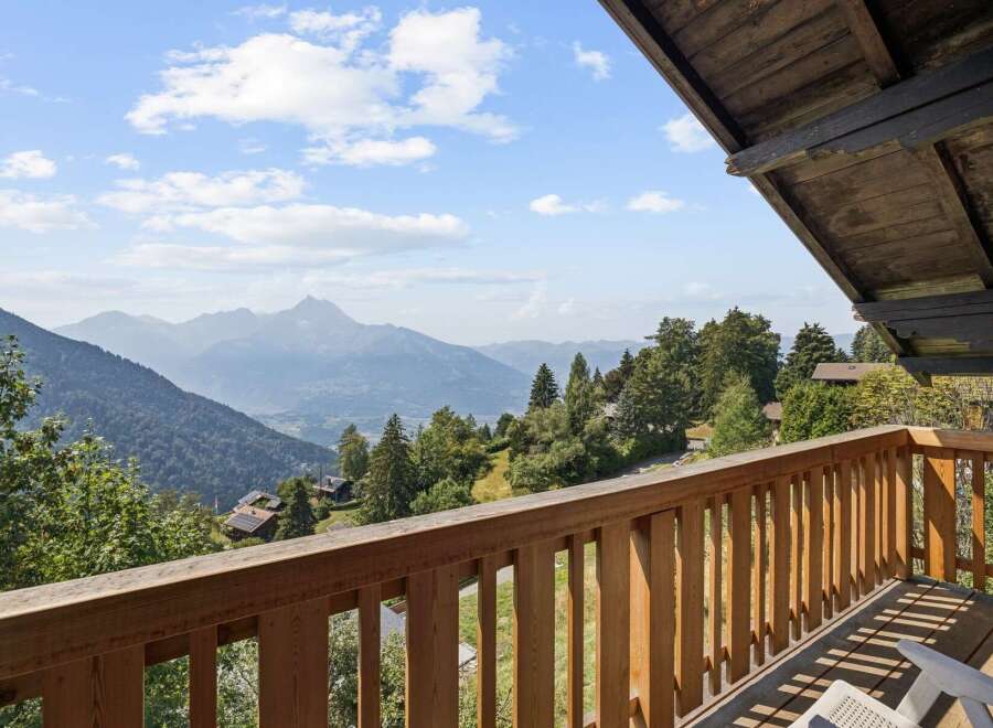 Experience breathtaking mountain views from this stunning property's private balcony, perfect for enjoying your morning coffee or evening sunset.