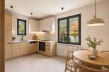 Experience modern living in this beautifully designed kitchen and dining area.