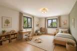 Discover this charming children's bedroom, perfect for fostering creativity and play.
