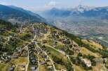 Discover this charming village nestled on a mountainside, offering breathtaking panoramic views of the valley and distant snow-capped peaks.