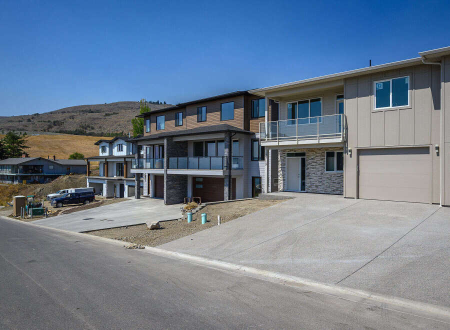 Discover modern living in this stunning multi-level townhouse development, featuring sleek architectural design and premium finishes.