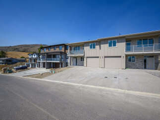 Discover modern living in this stunning multi-unit property, featuring sleek architecture and spacious layouts.