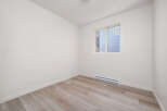 Discover this bright and airy room, perfect for a home office or a cozy bedroom.