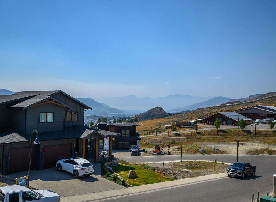 Discover modern living in this stunning new construction home, featuring a spacious multi-car garage and a sleek, contemporary design.