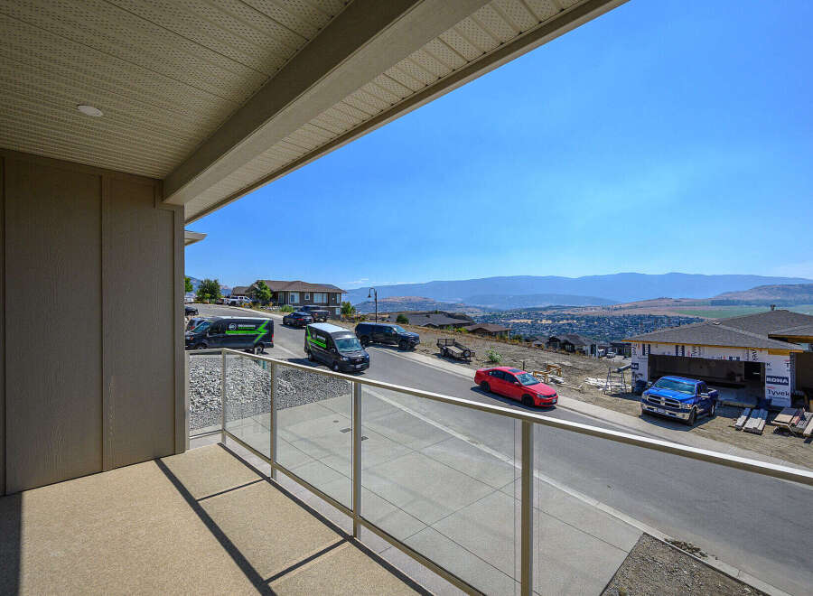 Enjoy breathtaking panoramic views from this stunning property, offering a prime vantage point over the valley and distant mountains.
