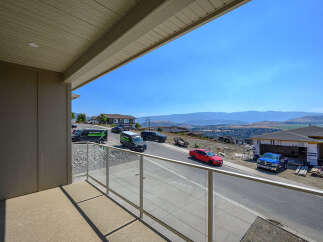 Enjoy breathtaking panoramic views from this stunning property, offering a prime vantage point over the valley and distant mountains.